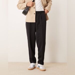 ASOS DESIGN smart oversized tapered pants with front pleat in black